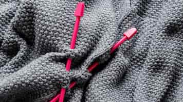 Free photo close up knitting needles and wool