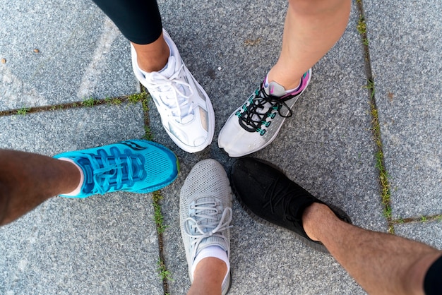 Close up legs wearing running shoes