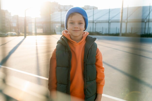 Close up on little boy playing basketball