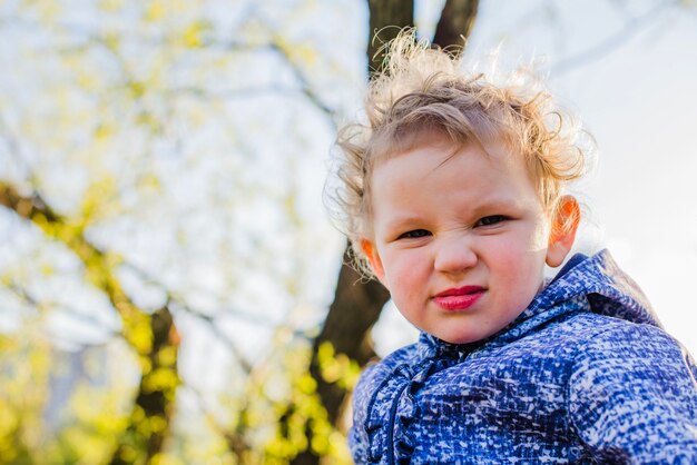 Free Photo close-up of little boy with funny face