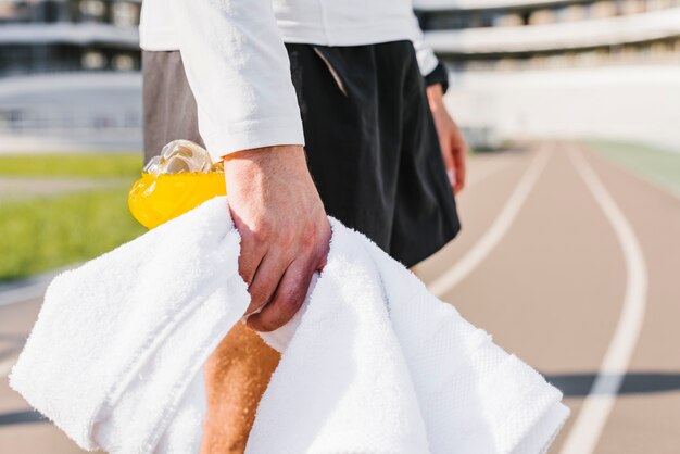 Close-up of man holding a towel