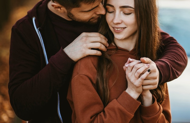 Free Photo close-up man holding woman