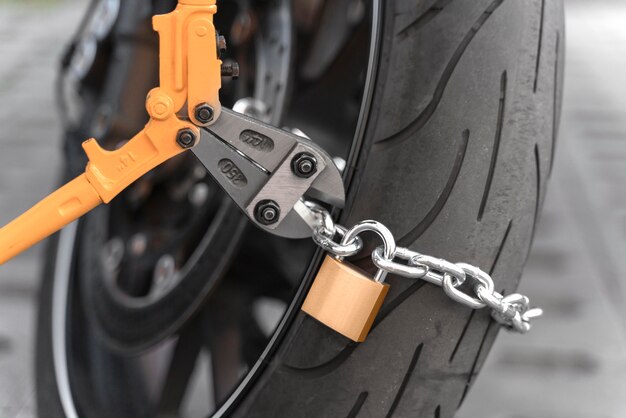 Close up on man preparing to steal a motorcycle