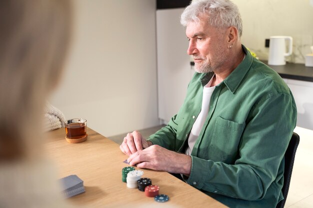 Close up man sitting at table