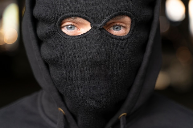 Close up on man trying to break into a car