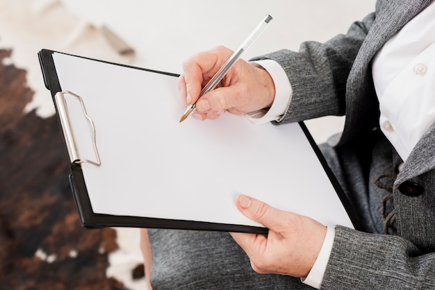 Close-up man with clipboard