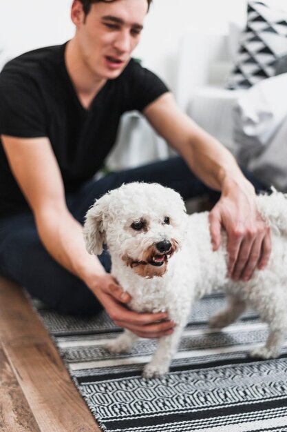 Close-up of a man with his dog