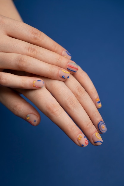 Close up manicure and blue background