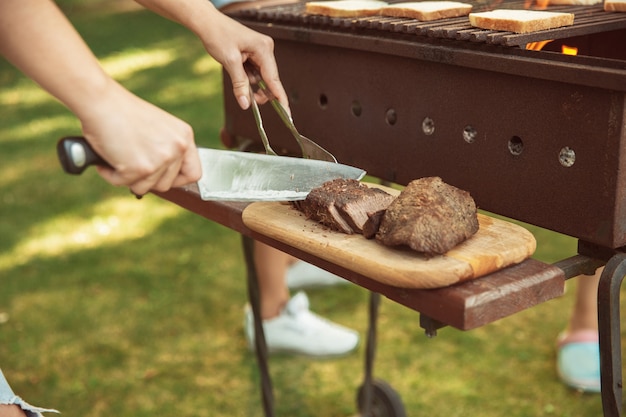 Free Photo close up of meat grilling, barbecue, summer lifestyle