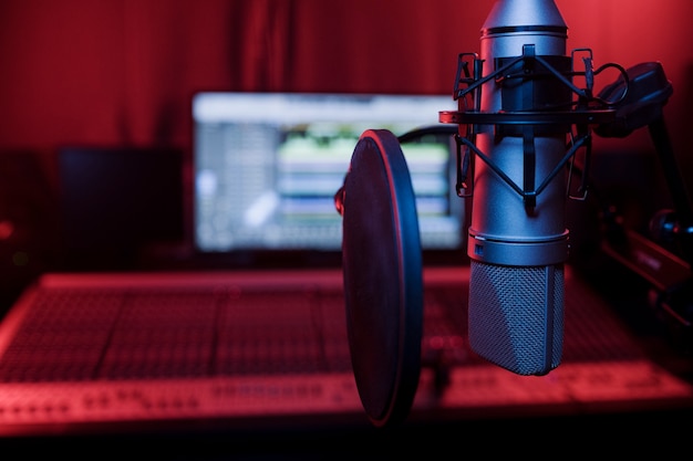 Close up microphone and pop filter in studio