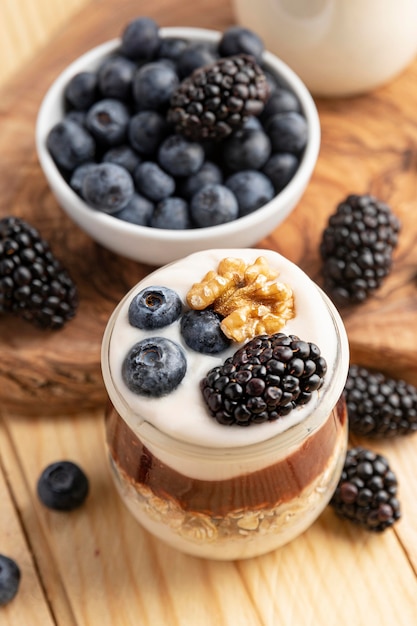 Close-up mix of yogurt with berries and oats