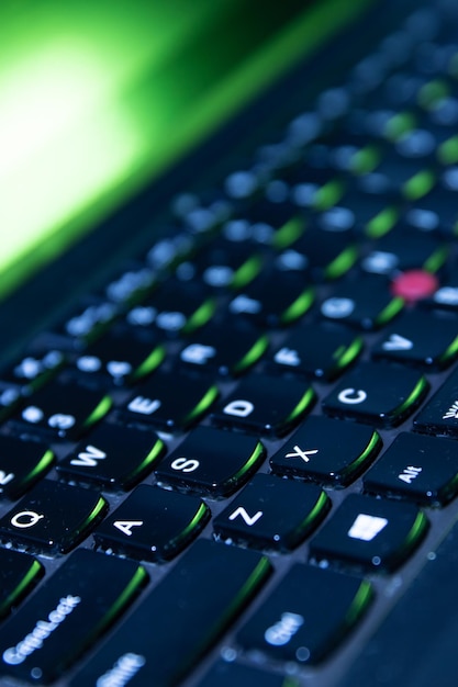 Free photo close-up of modern black keyboard. cropped image of laptop keyboard. computer, technology, gadget concept