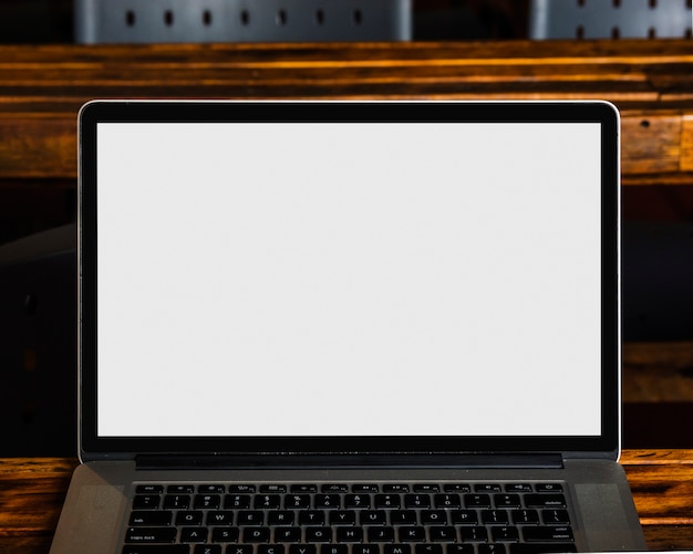 Close-up of modern laptop with white blank screen