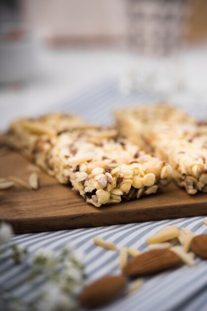 Close-up muesli batons on wooden board