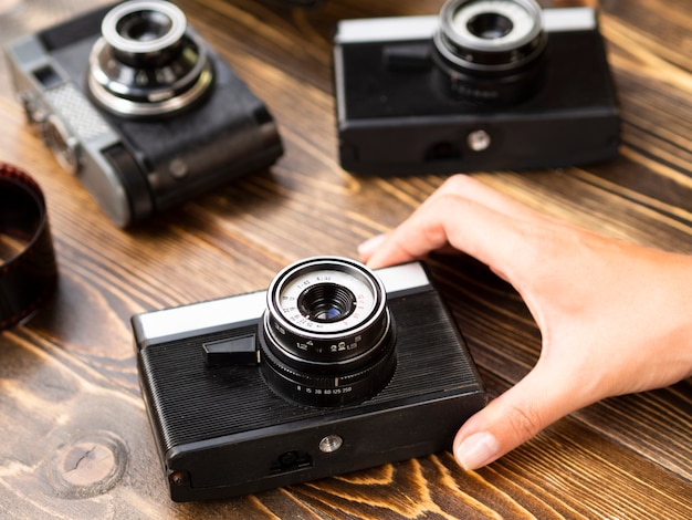 Close-up of multiple retro photo cameras