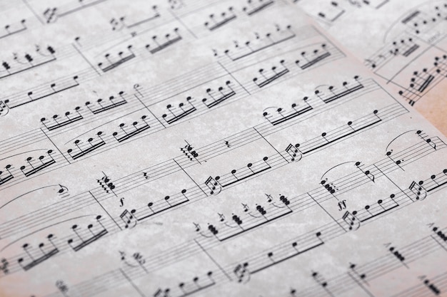 Free photo close up of music notes on paper