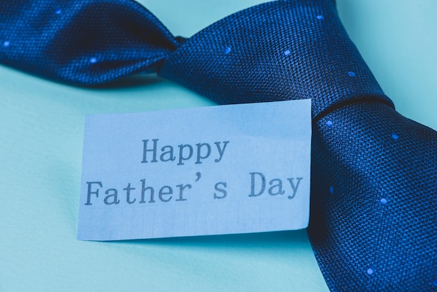 Free photo close-up of necktie and note for father's day