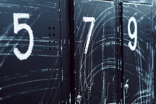 Free photo close-up of numbered lockers in gym