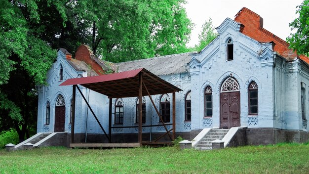 Close up on old abandoned house in a village