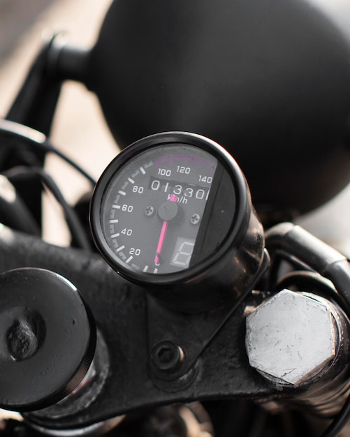 Free photo close-up old motorcycle speedometer