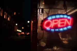 Free photo close-up open sign in neon lights