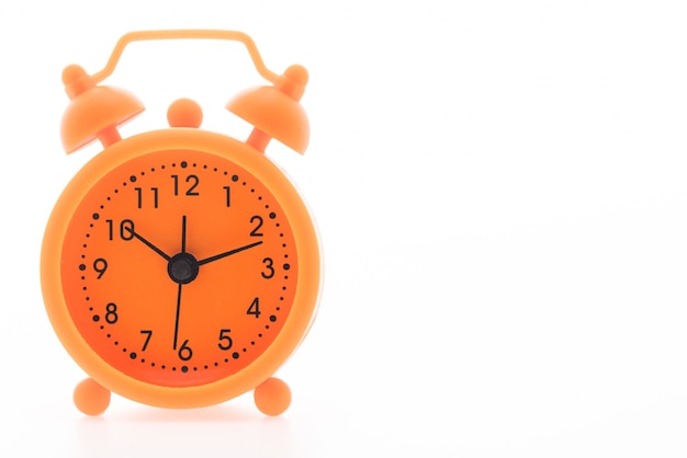 Free photo close-up of orange clock