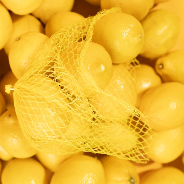 Free photo close-up organic lemons in a bag