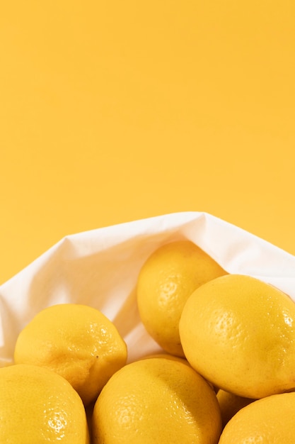 Free Photo close-up organic lemons with copy space