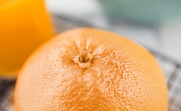 Free photo close-up organic orange on the table