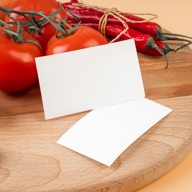 Free photo close-up of paper with tomatoes and chili peppers