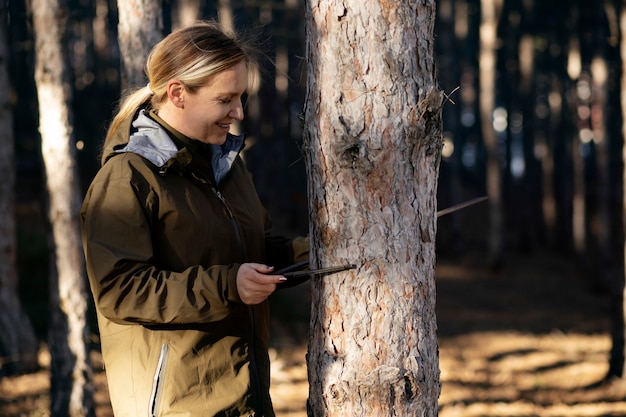 Close up on park ranger in woods