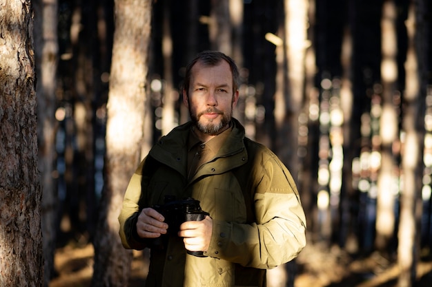 Close up on park ranger in woods