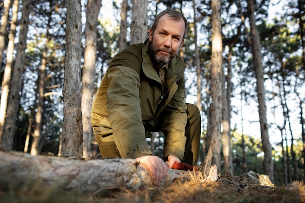 Close up on park ranger in woods