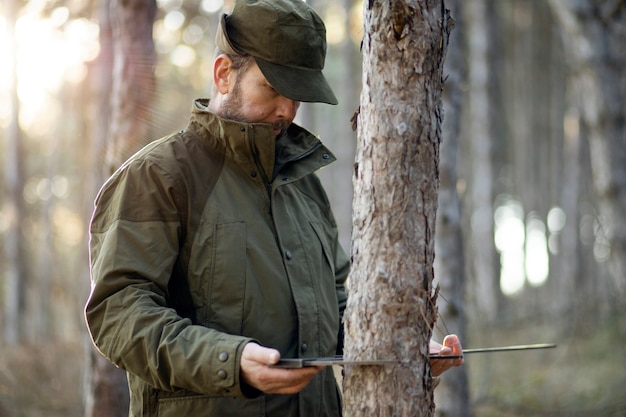 Free Photo close up on park ranger in woods