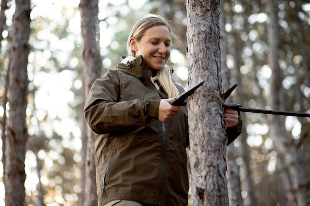 Close up on park ranger in woods