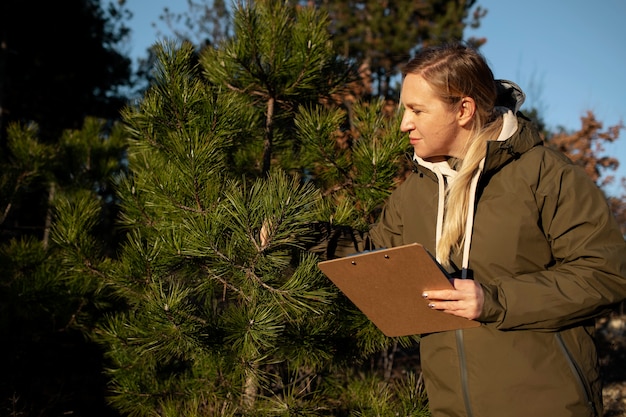 Close up on park ranger in woods