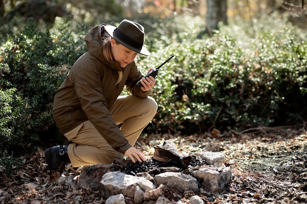 Close up on park ranger in woods