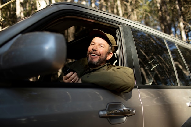 Close up on park ranger in woods