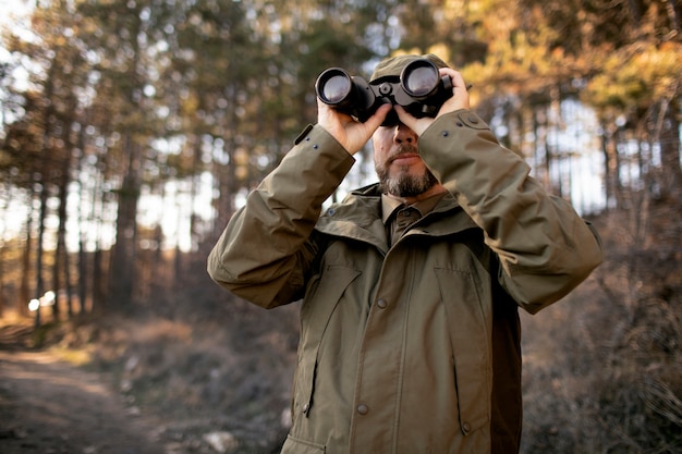 Free Photo close up on park ranger in woods