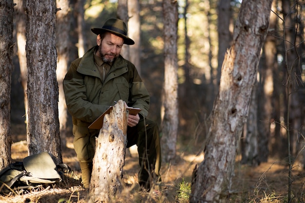 Free photo close up on park ranger in woods