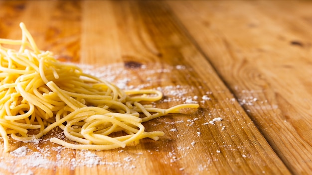 Free photo close-up of pasta and flour