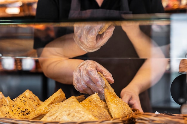 Free photo close up on pastry chef preparing food