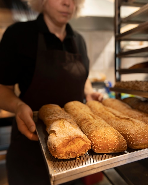 Free photo close up on pastry chef preparing food