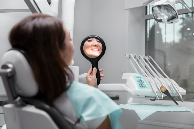 Close up patient looking in the mirror