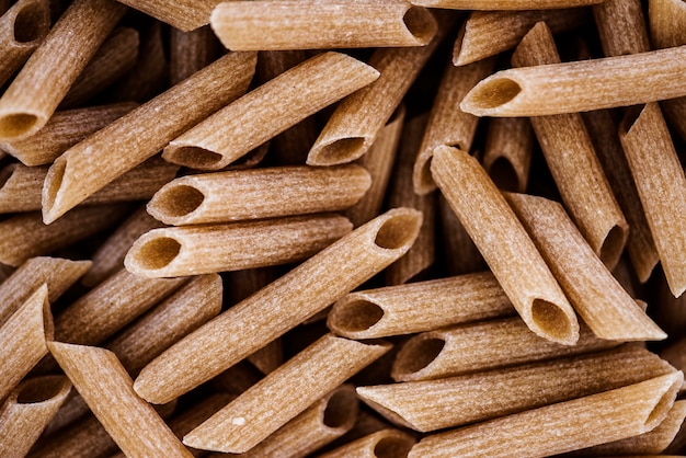 Free Photo close up of penne whole wheat pasta