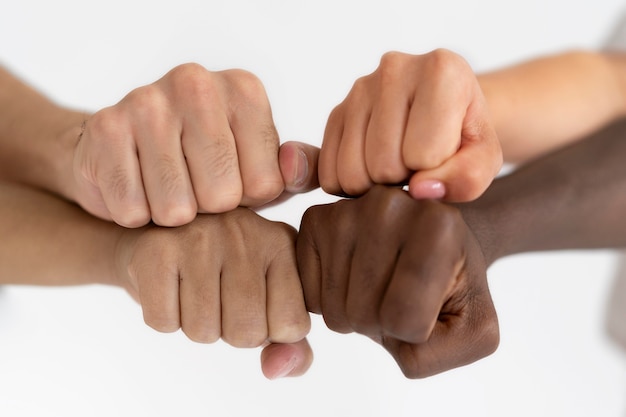 Close up on people connecting through hands