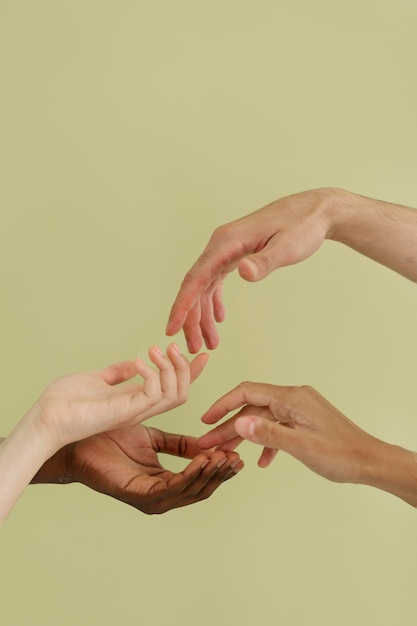 Close up on people connecting through hands