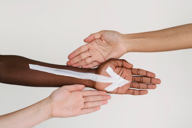 Close up on people connecting through hands