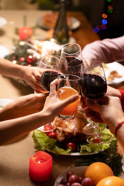 Close up on people enjoying christmas dinner