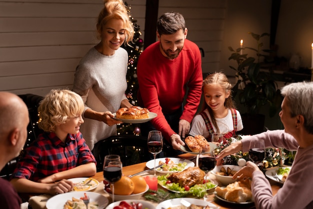 Close up on people preparing the christmas dinner